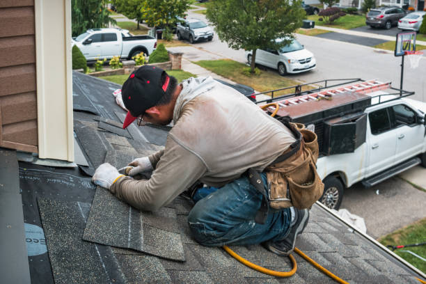 Professional Roofing technician working in Groton, NY